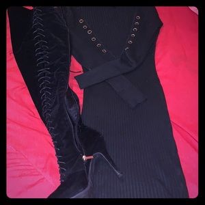 Black fitted cotton dress with Knee high boots